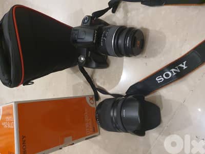 Sony Alpha 230 camera with 2 lenses