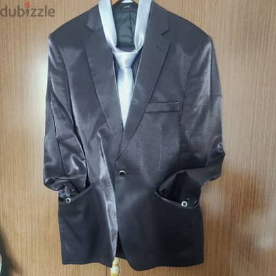 a suit used for one time only with its tie made in turkey ليوم واحد