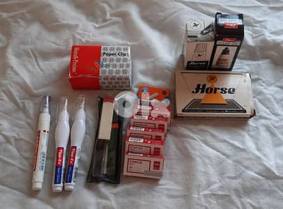 Staples, Tipex, paper clip, and stamp pad & ink