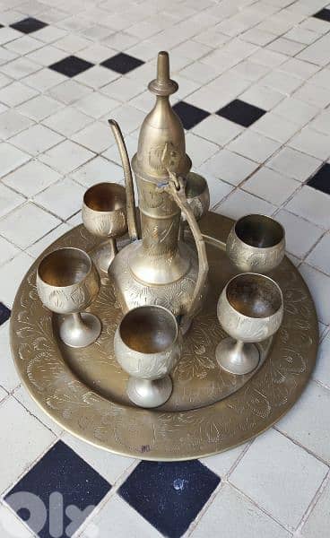 Antique 8 piece Brass Set finely tooled and etched. (Revised Price)