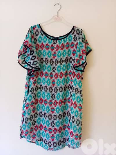Dresses and tops multiple colours and sizes