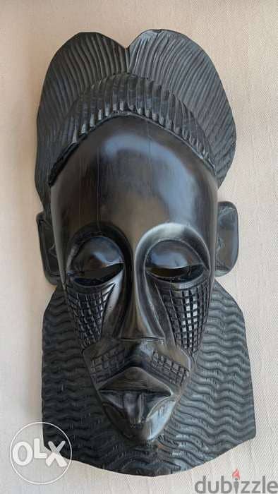 Ebony wood . handmade African mask