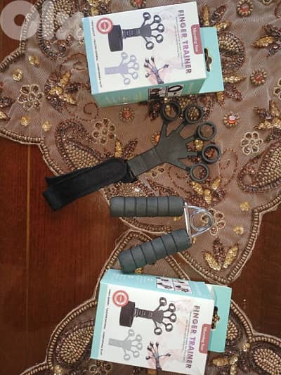 2 Finger trainers and 1 Hand Gripper