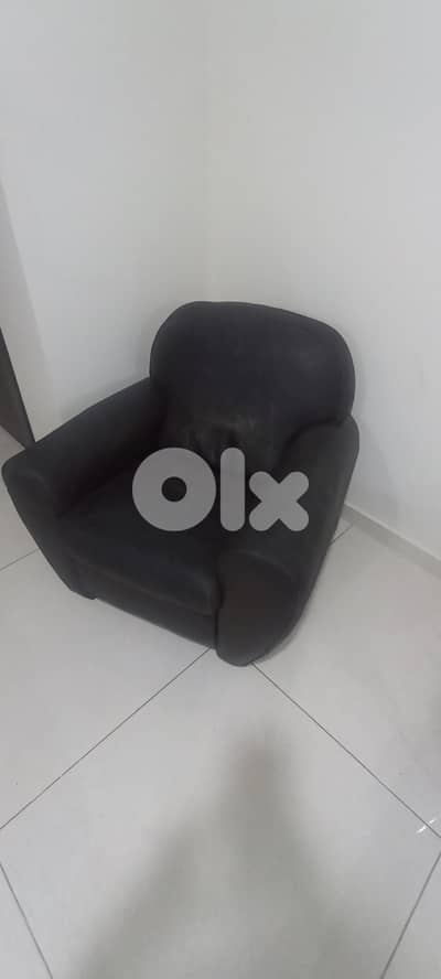 Dark brown leather armchair