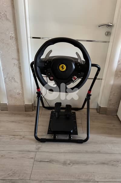 THRUSTMASTER 180 steering wheel + complete metal stand (make ur offer)
