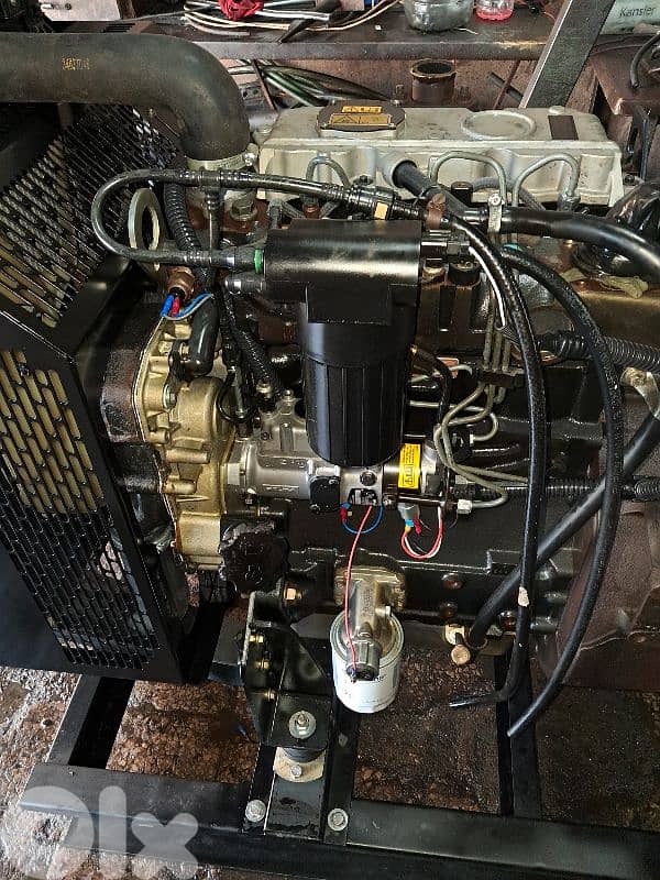 مولد 30 kva شبه جديد مجموعة انجليزية بدون كاتم 7