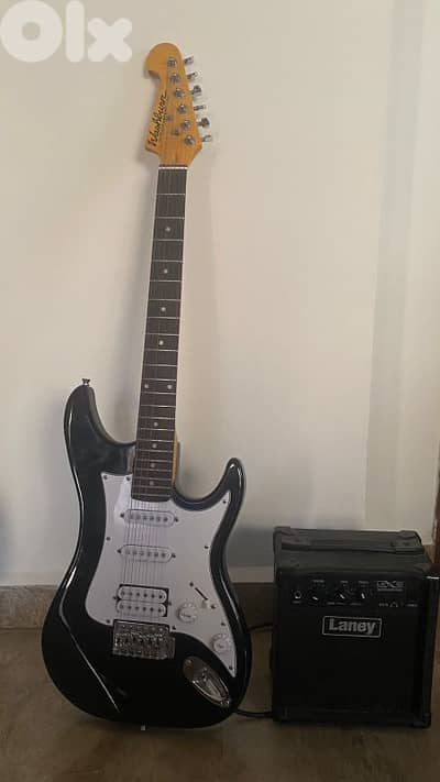 electric guitar with amp
