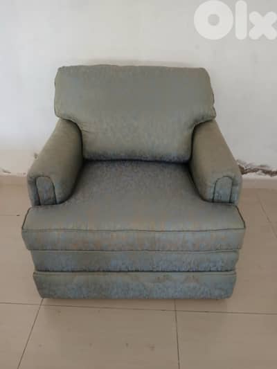 blue single sofa