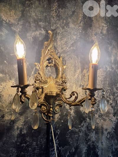 2 bronze and crystal wall lights