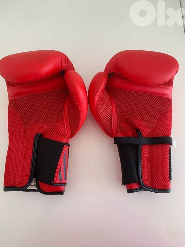 Boxing gloves as new 1