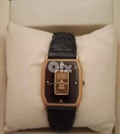 Milex Swiss collection watch with 1 grm Credit Suisse Gold 1980's.