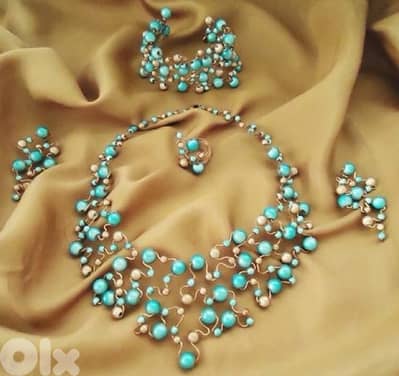 set fake pearl bracelet, neckless, earrings and ring.