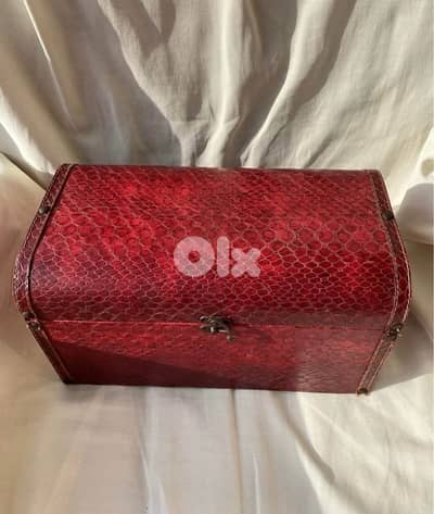 burgundy leather chest