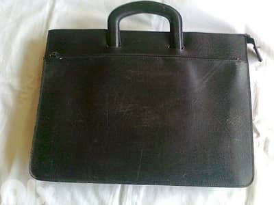 Old leather suitcase - Not Negotiable