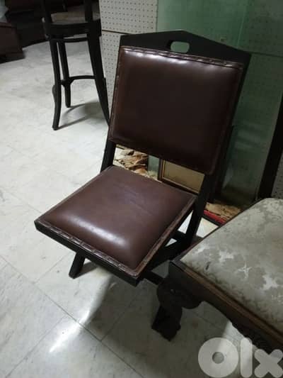 teak wood and authentic leather chair