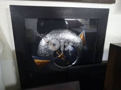Framed metal mural