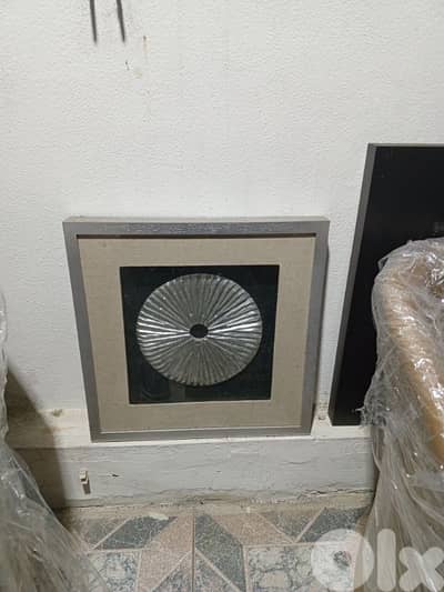 Framed metal mural