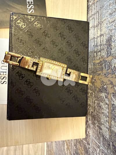 new guess gold watch with box and warranty card from abc department
