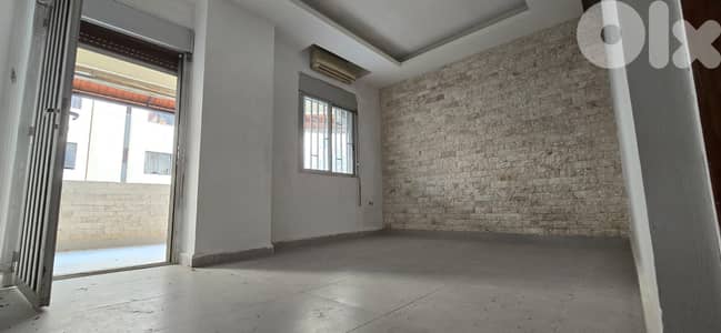 Apartment For Sale in Ballouneh - شقة للبيع في بلونة