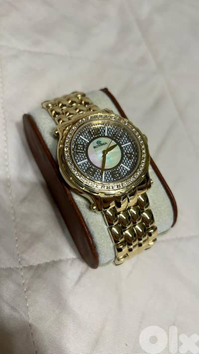 rovina gold woman watch