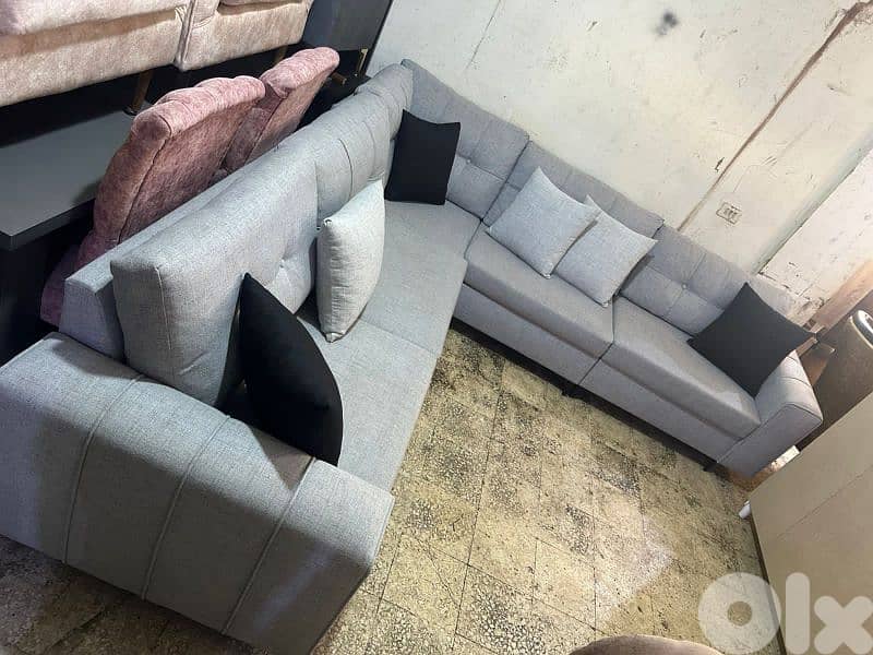 اوضة قعدة زاوية مع طاولة وبف كتير مرتبة 1