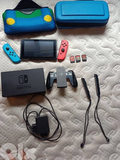 Urgently selling Nintendo Switch + 3 Games + Accessories (64GB SD)