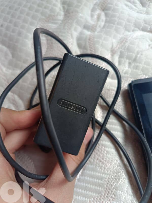 Urgently selling Nintendo Switch + 3 Games + Accessories (64GB SD) 7