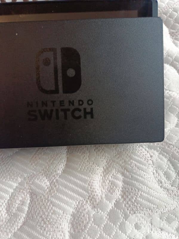 Urgently selling Nintendo Switch + 3 Games + Accessories (64GB SD) 9