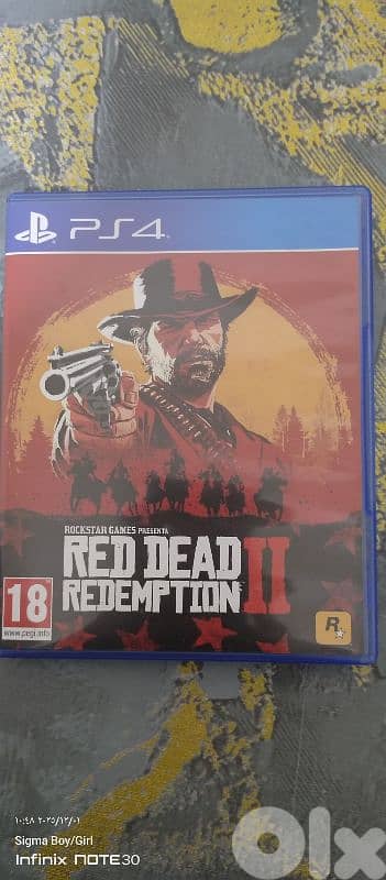 لقطة: PS4 Slim 1TB نظيف جداً + يد أصلية طبعة GTA VI + لعبة RDR2 2