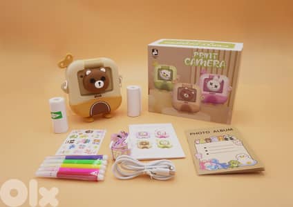 brown printing instant camera