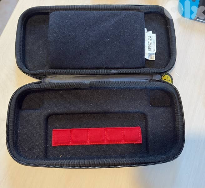 Nintendo Switch + 6 games + Case + accessories 3