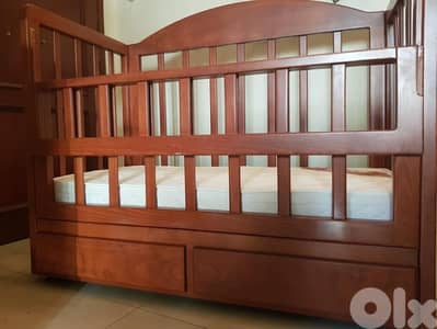 Baby crib with mattress