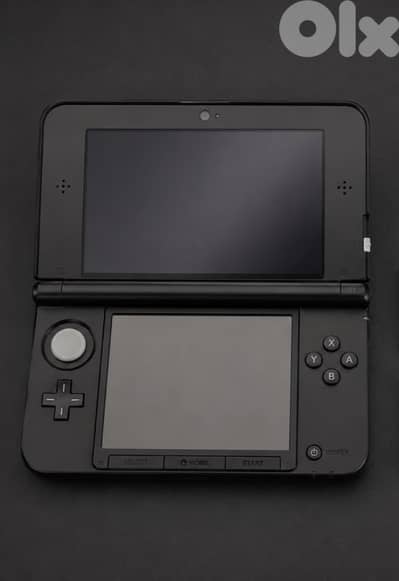 nintendo 3ds xl with games and sd cards