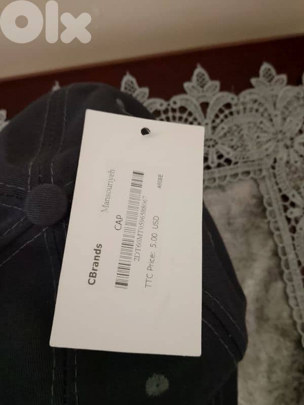 طاقية رجالي للبيع عدد 3 ماركة GUESS بعدون جديد سعر واحدي 5$ 11