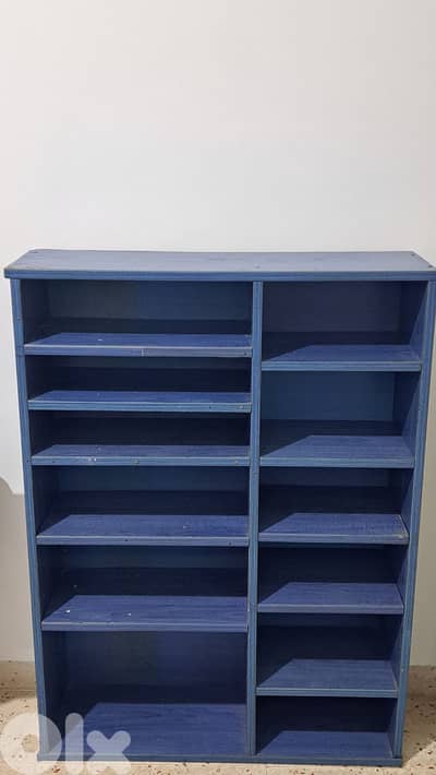 Blue wooden shelving unit