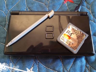 Used black ds lite(but in good condition) either 4 card if u whant