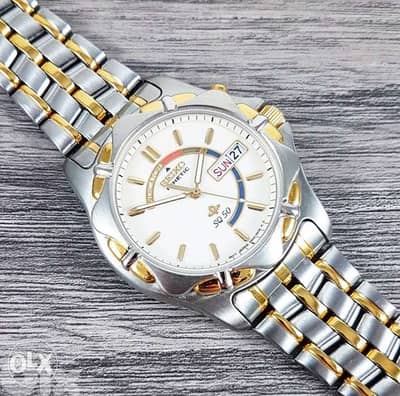 Seiko kinetic SQ50 day & date.