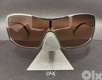 oakley Remedy sunglasses golden frame bronze glass in very good cond