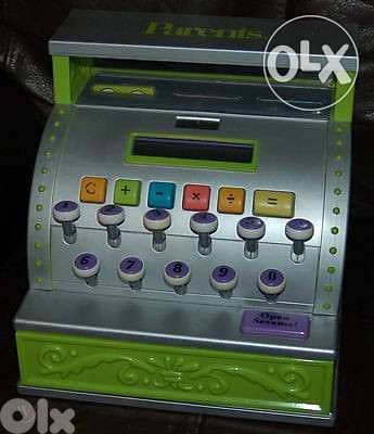 kids toy cash register by parents very realistic works on solar energy