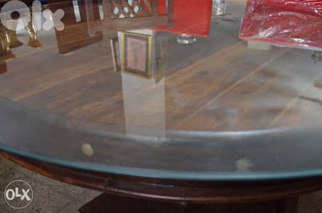 round solid wood teak table with 4 chairs