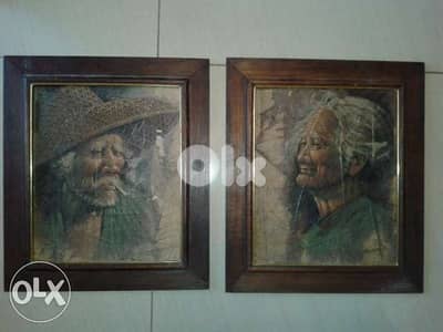 two old paintings on leaves signed size 34*39cm with the frame