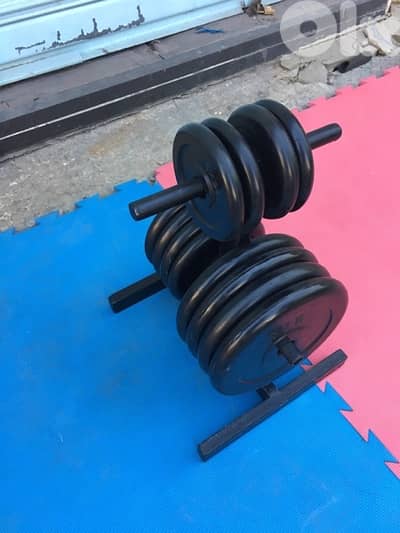 rack with rubber plates like new we have also all sports equipment