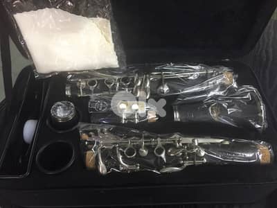 clarinet black full package كلارينت جديدة بالعلبة مع كل اغراضها