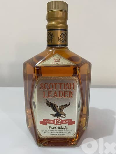 rare antique bottle of scotich leader