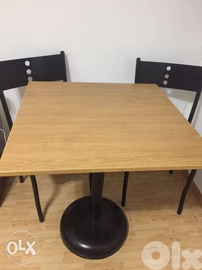 Table and 2 chairs. wood and metal. طاولة وكراسي