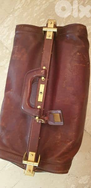 price  reduced antique hand made bag quen leather