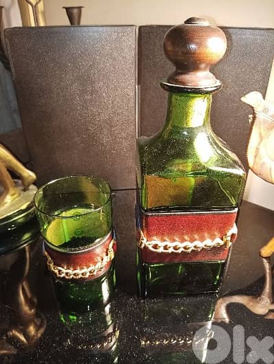 Vintage set of green bottle glass decanter with leather wrap